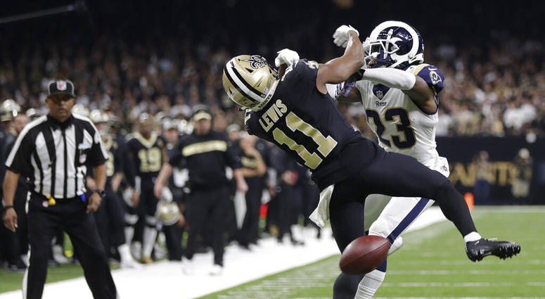 New Orleans Saints wide receiver Tommylee Lewis (11) works for a coach against Los Angeles Rams defensive back Nickell Robey-Coleman New Orleans Saints wide receiver Tommylee Lewis (11) works for a coach against Los Angeles Rams defensive back Nickell Robey-Coleman