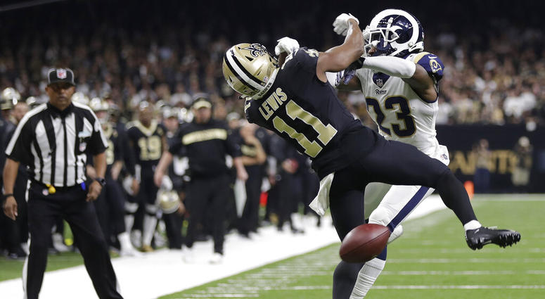 New Orleans Saints wide receiver Tommylee Lewis works for a coach against Los Angeles Rams defensive back Nickell Robey-Coleman AP DO NOT USE