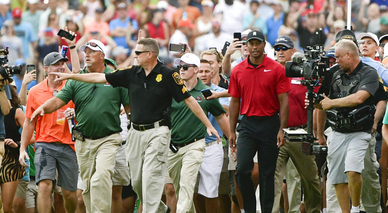 Tiger Woods making his way down the 18th fairway during the final round of the Tour Championship golf tournament in Atlanta. AP DO NOT USE