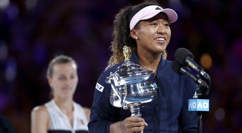 Japan's Naomi Osaka holds her trophy after defeating Petra Kvitova, left, of the Czech Republic during the women's singles final at the Australian Open tennis championships in Melbourne, Australia, Saturday, Jan. 26, 2019 Japan's Naomi Osaka holds her trophy after defeating Petra Kvitova, left, of the Czech Republic during the women's singles final at the Australian Open tennis championships in Melbourne, Australia, Saturday, Jan. 26, 2019