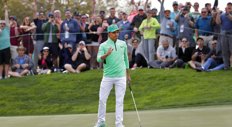 Rickie Fowler waves after making a birdie putt on the fifth green during the third round of the Phoenix Open PGA golf tournament, Saturday, Feb. 2, 2019 Rickie Fowler waves after making a birdie putt on the fifth green during the third round of the Phoenix Open PGA golf tournament, Saturday, Feb. 2, 2019