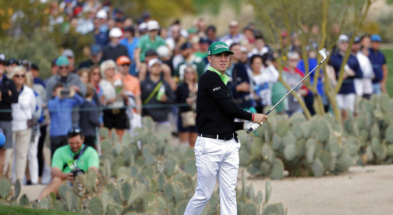 Justin Thomas hits from the second fairway during the third round of the Phoenix Open PGA golf tournament, Saturday, Feb. 2, 2019, in Scottsdale, Ariz Justin Thomas hits from the second fairway during the third round of the Phoenix Open PGA golf tournament, Saturday, Feb. 2, 2019, in Scottsdale, Ariz
