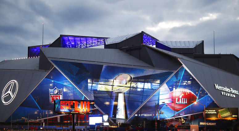 Mercedes-Benz Stadium is lit up ahead of Sunday's NFL Super Bowl 53 football game between the Los Angeles Rams and New England Patriots in Atlanta, Saturday, Feb. 2, 2019 Mercedes-Benz Stadium is lit up ahead of Sunday's NFL Super Bowl 53 football game between the Los Angeles Rams and New England Patriots in Atlanta, Saturday, Feb. 2, 2019