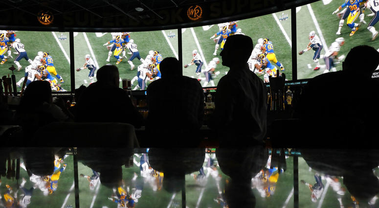 People watch Super Bowl LIII at the Westgate Superbook sports book, Sunday, Feb. 3, 2019, in Las Vegas. People watch Super Bowl LIII at the Westgate Superbook sports book, Sunday, Feb. 3, 2019, in Las Vegas.