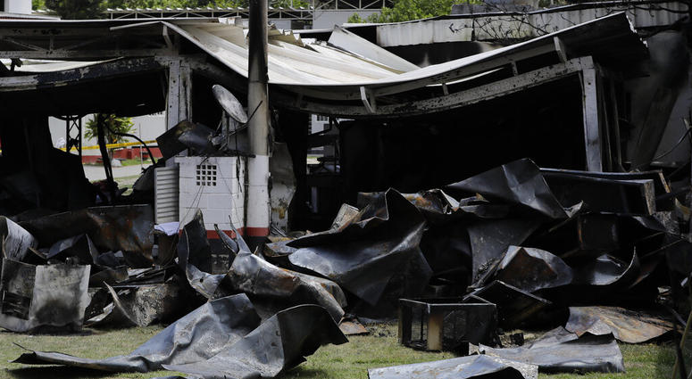 Debris from the deadly fire at the Flamengo soccer club training complex litters the ground in Rio de Janeiro, Brazil, Friday, Feb. 8, 2019 Debris from the deadly fire at the Flamengo soccer club training complex litters the ground in Rio de Janeiro, Brazil, Friday, Feb. 8, 2019
