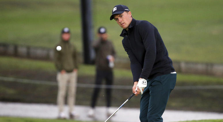 Jordan Spieth hits to the second green for a birdie during the first round of the Genesis Open golf tournament at Riviera Country Club in the Pacific Palisades area of Los Angeles AP DO NOT USE