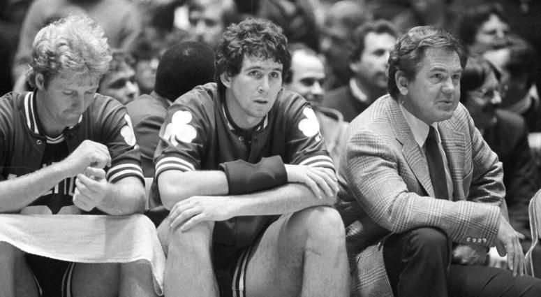 Boston Celtics coach Bill Fitch and players Rick Robey, center, and Larry Bird watch from the bench as their team loses to the Philadelphia 76ers 122-105 in an NBA basketball game Philadelphia. Boston Celtics coach Bill Fitch and players Rick Robey, center, and Larry Bird watch from the bench as their team loses to the Philadelphia 76ers 122-105 in an NBA basketball game Philadelphia.