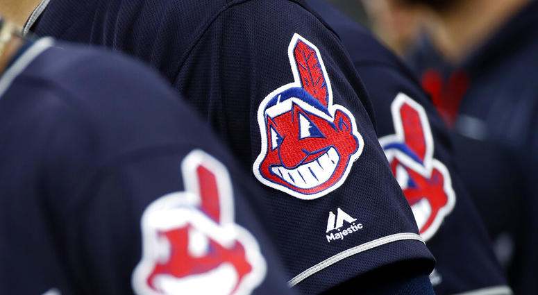 members of the Cleveland Indians wear uniforms featuring mascot Chief Wahoo members of the Cleveland Indians wear uniforms featuring mascot Chief Wahoo