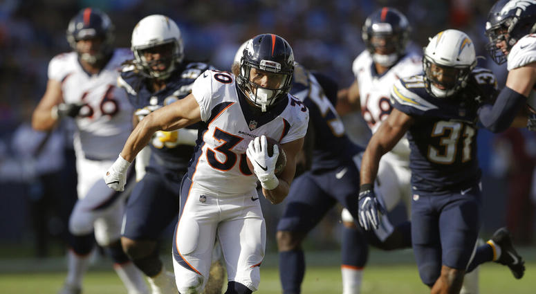 In this Nov. 18, 2018, file photo, Denver Broncos running back Phillip Lindsay runs for a touchdown during the first half of an NFL football game against the Los Angeles Chargers AP DO NOT USE