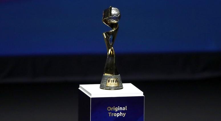 the Women's World Cup trophy is displayed at the women's soccer 2019 World Cup draw, in Boulogne-Billancourt, outside Paris. AP DO NOT USE