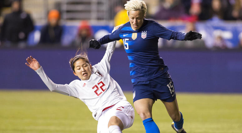 United States' Megan Rapinoe, right, tries to get around Japan's Risa Shimizu, left, with the ball during the first half of SheBelieves Cup soccer match, Wednesday, Feb. 27, 2019, in Chester, Pa United States' Megan Rapinoe, right, tries to get around Japan's Risa Shimizu, left, with the ball during the first half of SheBelieves Cup soccer match, Wednesday, Feb. 27, 2019, in Chester, Pa