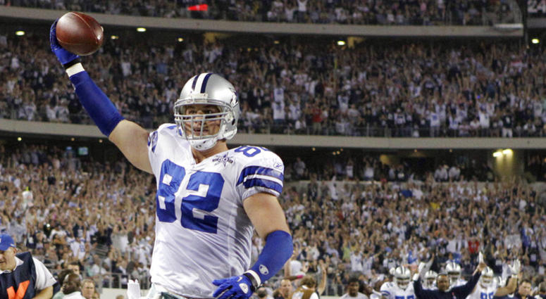 Dallas Cowboys tight end Jason Witten holds the ball up as he scores a 4-yard touchdown against the New York Giants AP DO NOT USE