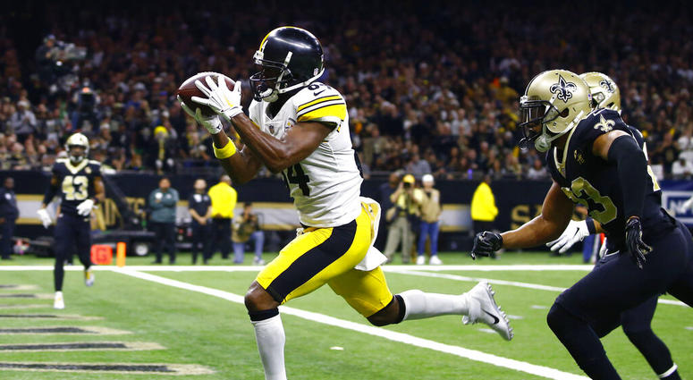 Pittsburgh Steelers wide receiver Antonio Brown (84) pulls in a pass reception in front of New Orleans Saints cornerback Marshon Lattimore, foreground right, and strong safety Kurt Coleman in the second half of an NFL football game in New Orleans. AP DO NOT USE