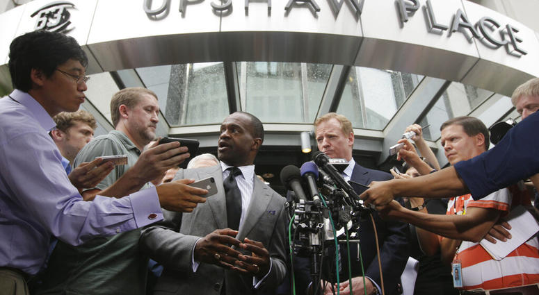 NFLPA Executive Director DeMaurice Smith, left, and NFL football Commissioner Roger Goodell speak during a news conference at the NFL Players Association in Washington, after the NFL Players Association executive board and 32 team reps voted unanimously t NFLPA Executive Director DeMaurice Smith, left, and NFL football Commissioner Roger Goodell speak during a news conference at the NFL Players Association in Washington, after the NFL Players Association executive board and 32 team reps voted unanimously t