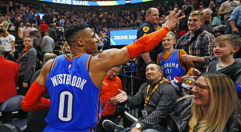 Oklahoma City Thunder guard Russell Westbrook (0) waves to the crowd as he leaves the court following an NBA basketball game against the Utah Jazz, Monday, March 11, 2019, in Salt Lake City. DO NOT USE