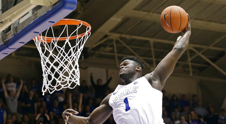 Duke's Zion Williamson (1) dunks during the second half of an NCAA college basketball game against Clemson, in Durham, N.C. AP DO NOT USE