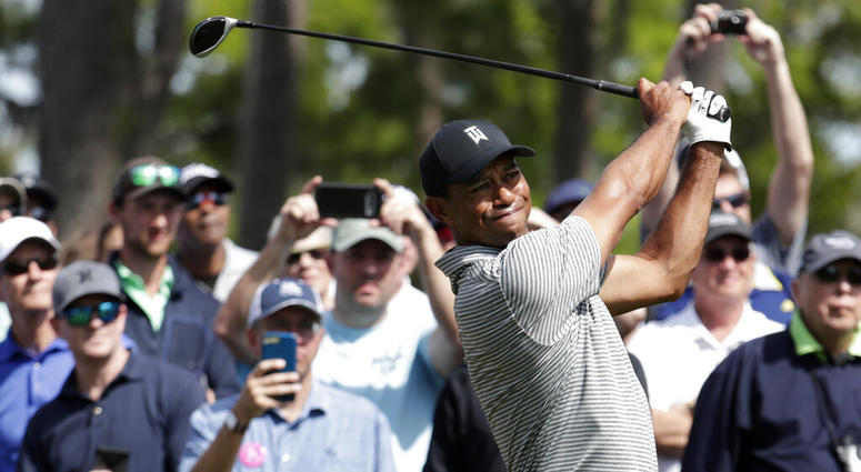 Tiger Woods hits from the seventh tee during a practice round at The Players Championship golf tournament, Wednesday, March 13, 2019, in Ponte Vedra Beach, Fla Tiger Woods hits from the seventh tee during a practice round at The Players Championship golf tournament, Wednesday, March 13, 2019, in Ponte Vedra Beach, Fla