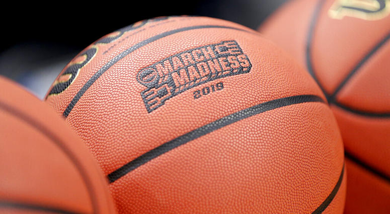 A basketball with March Madness 2019 sits in a rack before Michigan practice at the NCAA college basketball tournament in Des Moines, Iowa, Wednesday, March 20, 2019. AP DO NOT USE