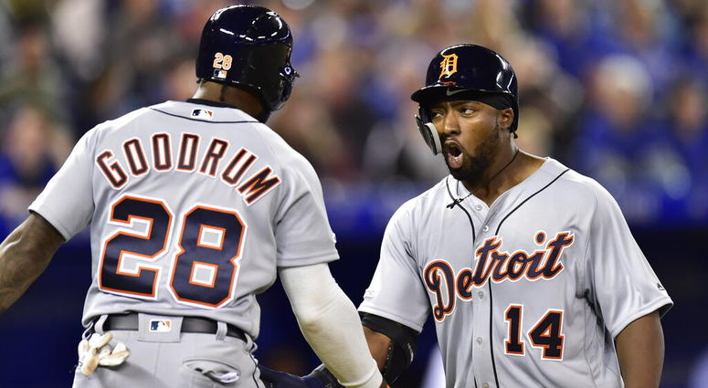 Detroit Tigers' Christin Stewart (14) celebrates his two-run home run with Niko Goodrum (28) during the 10th inning against the Toronto Blue Jays in a baseball game in Toronto, Thursday, March 28, 2019. AP DO NOT USE