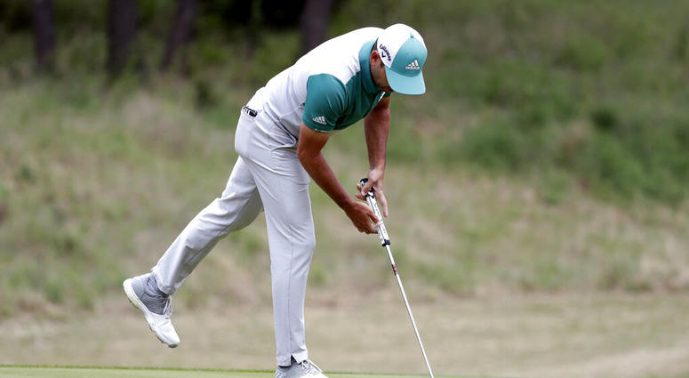 ergio Garcia reaches to pick up his ball after he missed his second putt on No. 7 during quarterfinal play against Matt Kuchar at the Dell Technologies Match Play Championship golf tournament, Saturday, March 30, 2019, in Austin, Texas AP DO NOT USE
