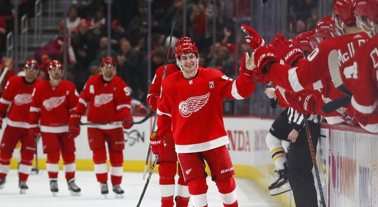 Detroit Red Wings left wing Taro Hirose greets the bench after scoring during the third period of an NHL hockey game against the Boston Bruins, Sunday, March 31, 2019, in Detroit. AP DO NOT USE