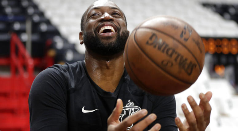 Miami Heat guard Dwyane Wade tosses a basketball before a game against the Philadelphia 76ers, Tuesday, April 9, 2019, in Miami. AP DO NOT USE