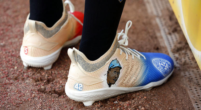Texas Rangers' Delino DeShields wears shoes with Jackie Robinson's image prior to playing the Los Angels Angels in a baseball game Monday, April 15, 2019, in Arlington, Texas AP DO NOT USE