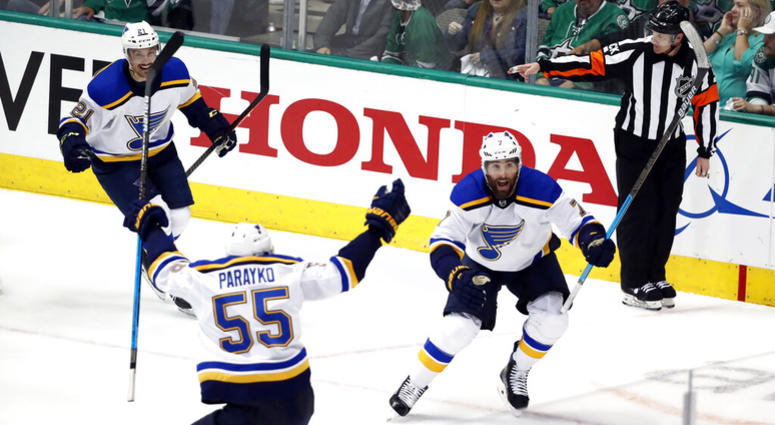 St. Louis Blues' Tyler Bozak (21), Colton Parayko (55) and Pat Maroon (7) celebrate a goal by Maroon against the Dallas Stars in the third period of Game 3 of an NHL second-round hockey playoff series in Dallas, Monday, April 29, 2019. AP DO NOT USE