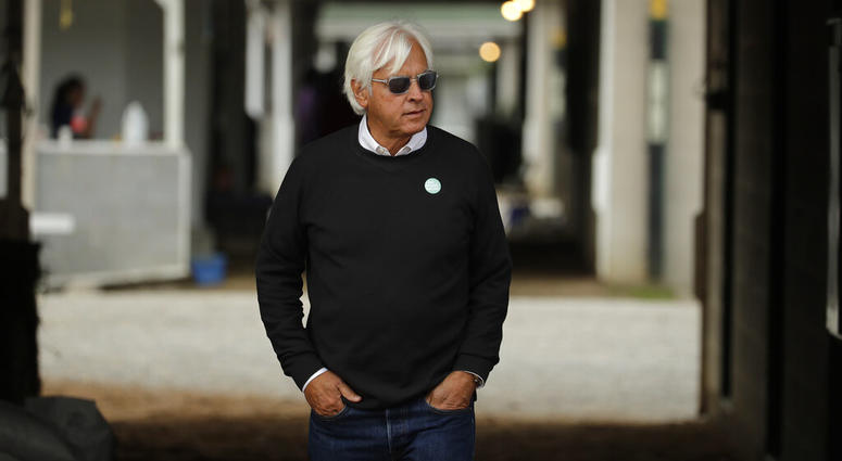 Trainer Bob Baffert looks out from his barn before a workout at Churchill Downs Wednesday, May 1, 2019, in Louisville, Ky. Baffert has three horses competing in the 145th running of the Kentucky Derby which is scheduled for Saturday, May 4 AP DO NOT USE