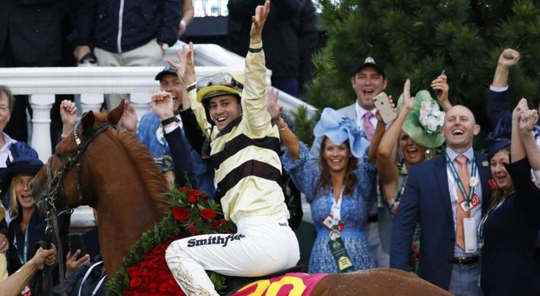Flavien Prat celebrates after riding Country House to victory during the 145th running of the Kentucky Derby horse race at Churchill Downs Saturday, May 4, 2019, in Louisville, Ky. AP DO NOT USE