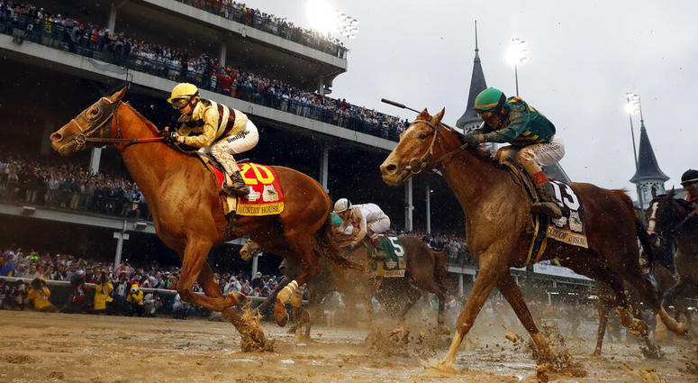 In this May 4, 2019, file photo, Flavien Prat rides Country House to the finish line during the 145th running of the Kentucky Derby horse race at Churchill Downs in Louisville, Ky AP DO NOT USE