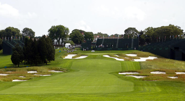 In this June 12, 2009, file photo, Bunkers line the fairway and protect the green on the 18th hole of Bethpage State Park's Black Course in Farmingdale, N.Y. AP DO NOT USE`