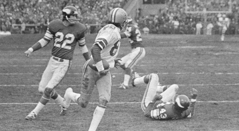Dec. 28, 1975, file photo Dallas Cowboys wide receiver Drew Pearson (88) nears the end zone with the game-winning 50-yard touchdown pass late in the fourth quarter as the Cowboys defeated the Minnesota Vikings in the NFC playoff AP DO NTO USE