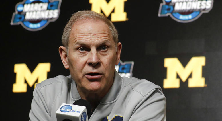 In this March 27, 2019 file photo Michigan head coach John Beilein speaks during a news conference at the NCAA college basketball tournament in Anaheim, Calif. ap do not use