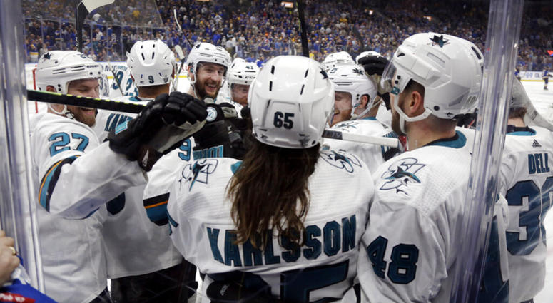 San Jose Sharks defenseman Erik Karlsson (65), of Sweden, is congratulated after scoring the winning goal against the St. Louis Blues during overtime in Game 3 of the NHL hockey Stanley Cup Western Conference final series Wednesday, May 15, 2019, in St. L AP DO NOT USE