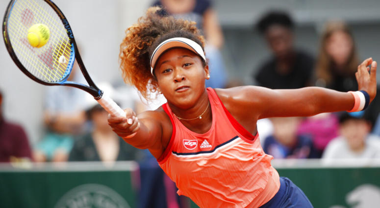 In this May 30, 2018, file photo, Japan's Naomi Osaka returns a shot against Kazakhstan's Zarina Diyas during their second round match of the French Open tennis tournament at the Roland Garros stadium in Paris, France. AP DO NOT USE