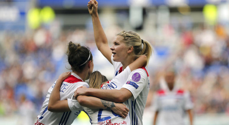 In this Sunday, April 21, 2019 file photo, Lyon's Delphine Cascarino, center, celebrates with Ada Hegerberg, right, and Lucy Bronze after scoring against Chelsea during the Women's Champions League semifinal soccer match in Decines, France AP DO NOT USE