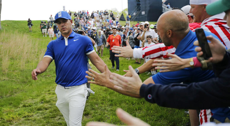 Brooks Koepka greets spectators as he walks down to the 15th tee during the second round of the PGA Championship golf tournament, Friday, May 17, 2019, at Bethpage Black in Farmingdale, N.Y. Brooks Koepka greets spectators as he walks down to the 15th tee during the second round of the PGA Championship golf tournament, Friday, May 17, 2019, at Bethpage Black in Farmingdale, N.Y.