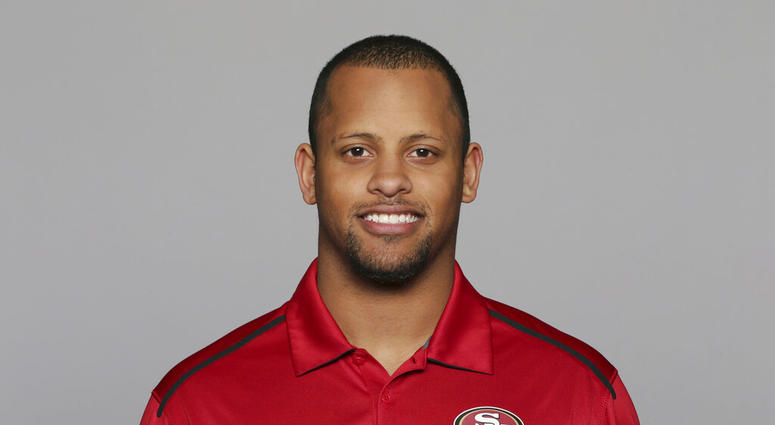 This 2016, file photo shows Keanon Lowe of the San Francisco 49ers NFL football team. Lowe, a former analyst for the 49ers and wide receiver at the University of Oregon, subdued a person with a gun who appeared on a Portland, Oregon high school campus Fr AP DO NOT USE