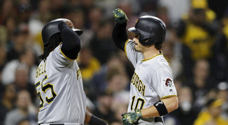 Pittsburgh Pirates' Bryan Reynolds, right, is greeted by Josh Bell after hitting a two-run home run during the fourth inning of the team's baseball game against the San Diego Padres, Friday, May 17, 2019, in San Diego. Pittsburgh Pirates' Bryan Reynolds, right, is greeted by Josh Bell after hitting a two-run home run during the fourth inning of the team's baseball game against the San Diego Padres, Friday, May 17, 2019, in San Diego.