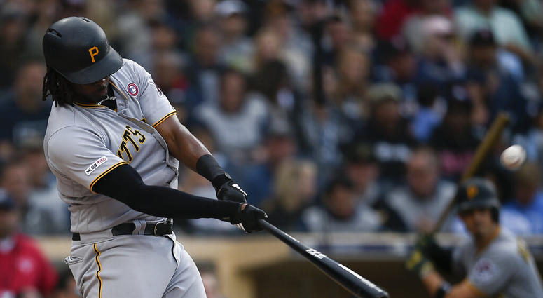 Pittsburgh Pirates' Josh Bell hits a three-run home run off a pitch by San Diego Padres' Nick Margevicius during the third inning of a baseball game in San Diego, Saturday, May 18, 2019. Pittsburgh Pirates' Josh Bell hits a three-run home run off a pitch by San Diego Padres' Nick Margevicius during the third inning of a baseball game in San Diego, Saturday, May 18, 2019.