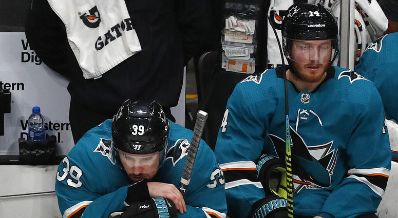 San Jose Sharks' Logan Couture (39) and Gustav Nyquist (14) react on the bench as the St. Louis Blues take a 5-0 lead in the third period in Game 5 of the NHL hockey Stanley Cup Western Conference finals in San Jose, Calif., on Sunday, May 19, 2019. San Jose Sharks' Logan Couture (39) and Gustav Nyquist (14) react on the bench as the St. Louis Blues take a 5-0 lead in the third period in Game 5 of the NHL hockey Stanley Cup Western Conference finals in San Jose, Calif., on Sunday, May 19, 2019.