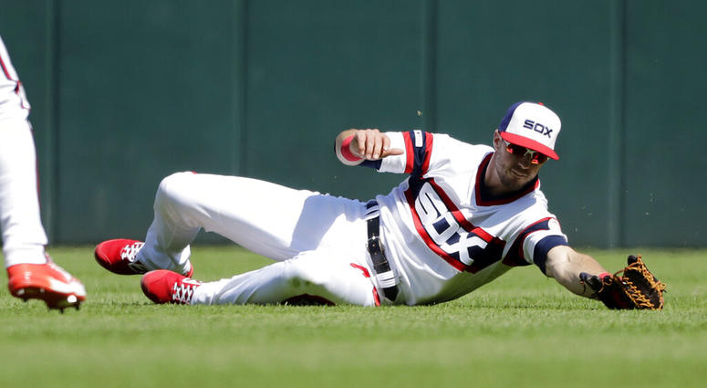 Chicago White Sox right fielder Ryan Cordell catches a fly ball by Cleveland Indians' Oscar Mercado during the ninth inning of a baseball game in Chicago, Sunday, June 2, 2019. The White Sox won 2-0. AP DO NOT USE
