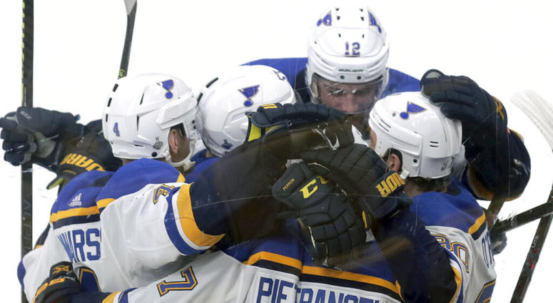 St. Louis Blues' Ryan O'Reilly, right, celebrates his goal against the Boston Bruins with teammates during the second period in Game 5 of the NHL hockey Stanley Cup Final, Thursday, June 6, 2019, in Boston. St. Louis Blues' Ryan O'Reilly, right, celebrates his goal against the Boston Bruins with teammates during the second period in Game 5 of the NHL hockey Stanley Cup Final, Thursday, June 6, 2019, in Boston.