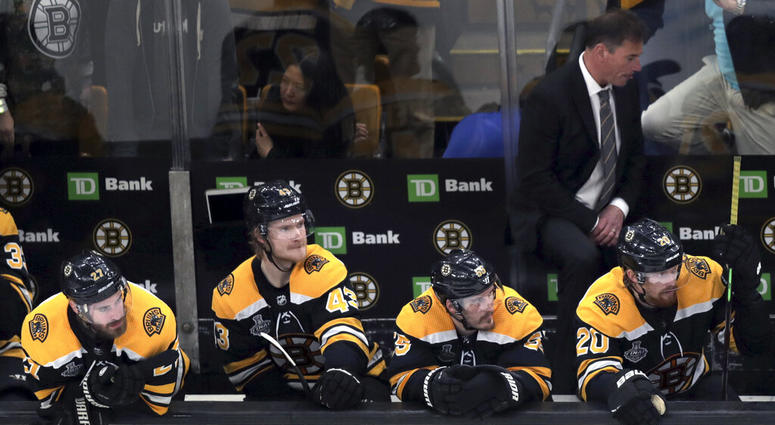 Boston Bruins players and head coach Bruce Cassidy, right rear, watch the final minutes in Game 5 of the NHL hockey Stanley Cup Final against the St. Louis Blues, Thursday, June 6, 2019, in Boston. Boston Bruins players and head coach Bruce Cassidy, right rear, watch the final minutes in Game 5 of the NHL hockey Stanley Cup Final against the St. Louis Blues, Thursday, June 6, 2019, in Boston.