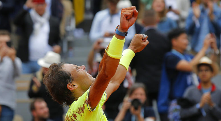 Spain's Rafael Nadal celebrates his record 12th French Open tennis tournament title after winning his men's final match against Austria's Dominic Thiem in four sets, 6-3, 5-7, 6-1, 6-1, at the Roland Garros stadium in Paris, Sunday, June 9, 2019. Spain's Rafael Nadal celebrates his record 12th French Open tennis tournament title after winning his men's final match against Austria's Dominic Thiem in four sets, 6-3, 5-7, 6-1, 6-1, at the Roland Garros stadium in Paris, Sunday, June 9, 2019.
