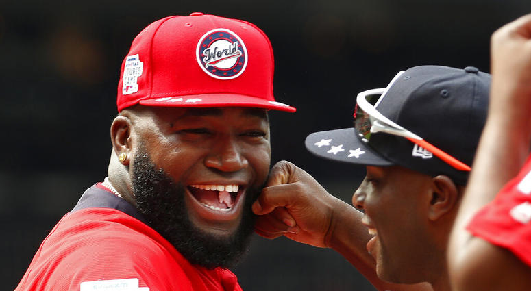 In this July 15, 2018, file photo, World Team Manager David Ortiz (34) speaks with U.S. Team Manager Torrii Hunter, before the All-Star Futures baseball game at Nationals Park, in Washington. AP DO NOT USE