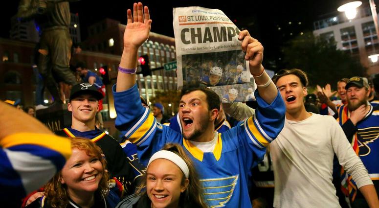 St. Louis Blues fans celebrate the team's victory over the Boston Bruins in Boston in Game 7 of the NHL hockey Stanley Cup Final, outside Busch Stadium in St. Louis after a watch party for the game was held in the baseball stadium Wednesday, June 12, 2019 St. Louis Blues fans celebrate the team's victory over the Boston Bruins in Boston in Game 7 of the NHL hockey Stanley Cup Final, outside Busch Stadium in St. Louis after a watch party for the game was held in the baseball stadium Wednesday, June 12, 2019