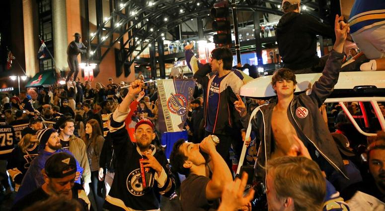 St. Louis Blues fans celebrate outside Busch Stadium in St. Louis, where a watch party had been held for Game 7 of the NHL hockey Stanley Cup Final between the Blues and the Boston Bruins in Boston, Wednesday, June 12, 2019. The Blues won the title. St. Louis Blues fans celebrate outside Busch Stadium in St. Louis, where a watch party had been held for Game 7 of the NHL hockey Stanley Cup Final between the Blues and the Boston Bruins in Boston, Wednesday, June 12, 2019. The Blues won the title.
