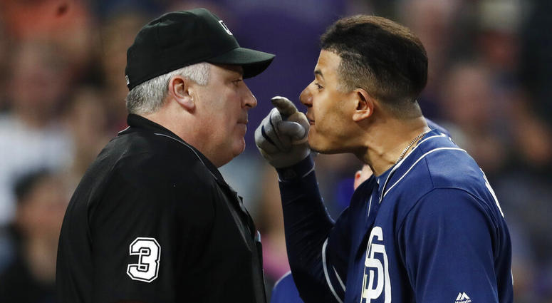 San Diego Padres shortstop Manny Machado, right, yells at home plate umpire Bill Welke, who had called Machado out on strikes during the fifth inning of the team's baseball game against the Colorado Rockies on Saturday, June 15, 2019, in Denver. San Diego Padres shortstop Manny Machado, right, yells at home plate umpire Bill Welke, who had called Machado out on strikes during the fifth inning of the team's baseball game against the Colorado Rockies on Saturday, June 15, 2019, in Denver.